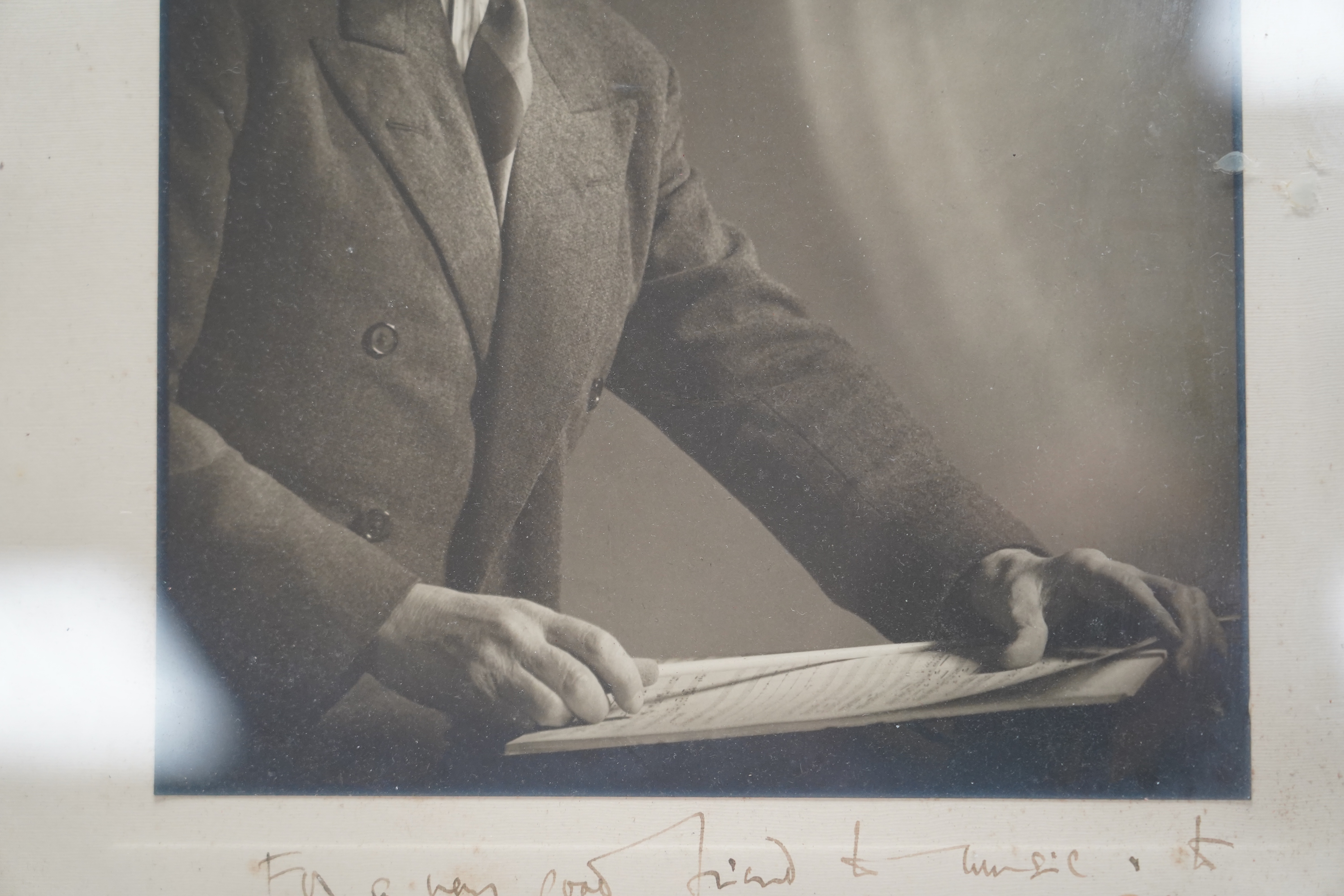 A signed photograph of the conductor Sir Adrian Boult with dedication dated 1952, frame 39.5 x 32cm